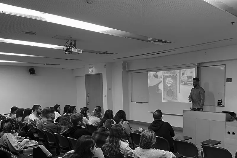 Guest lecture at the Academic College of Tel Aviv-Yaffo, in black and white.